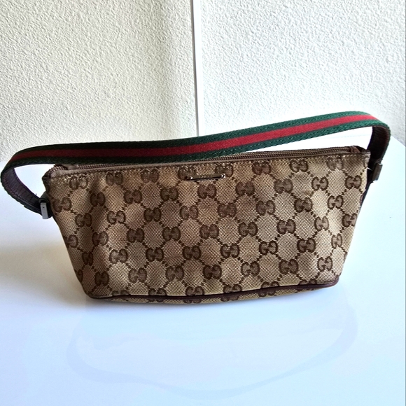 Gucci Handbags - Gucci GG Canvas Boat Bag Brown